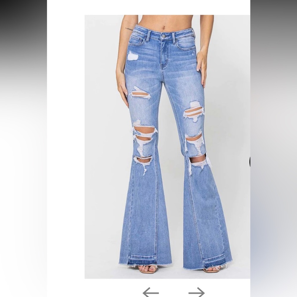 Distressed flare leg jeans